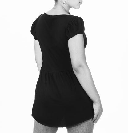 black cotton modal cap sleeve babydoll tee back view on model 