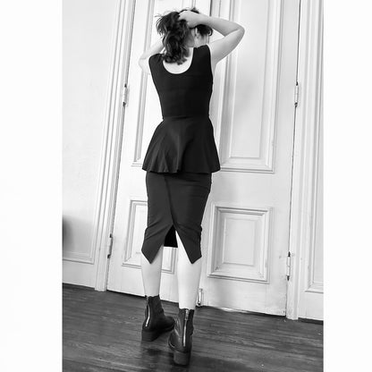 black cotton spandex knee length skirt slit back on model back view