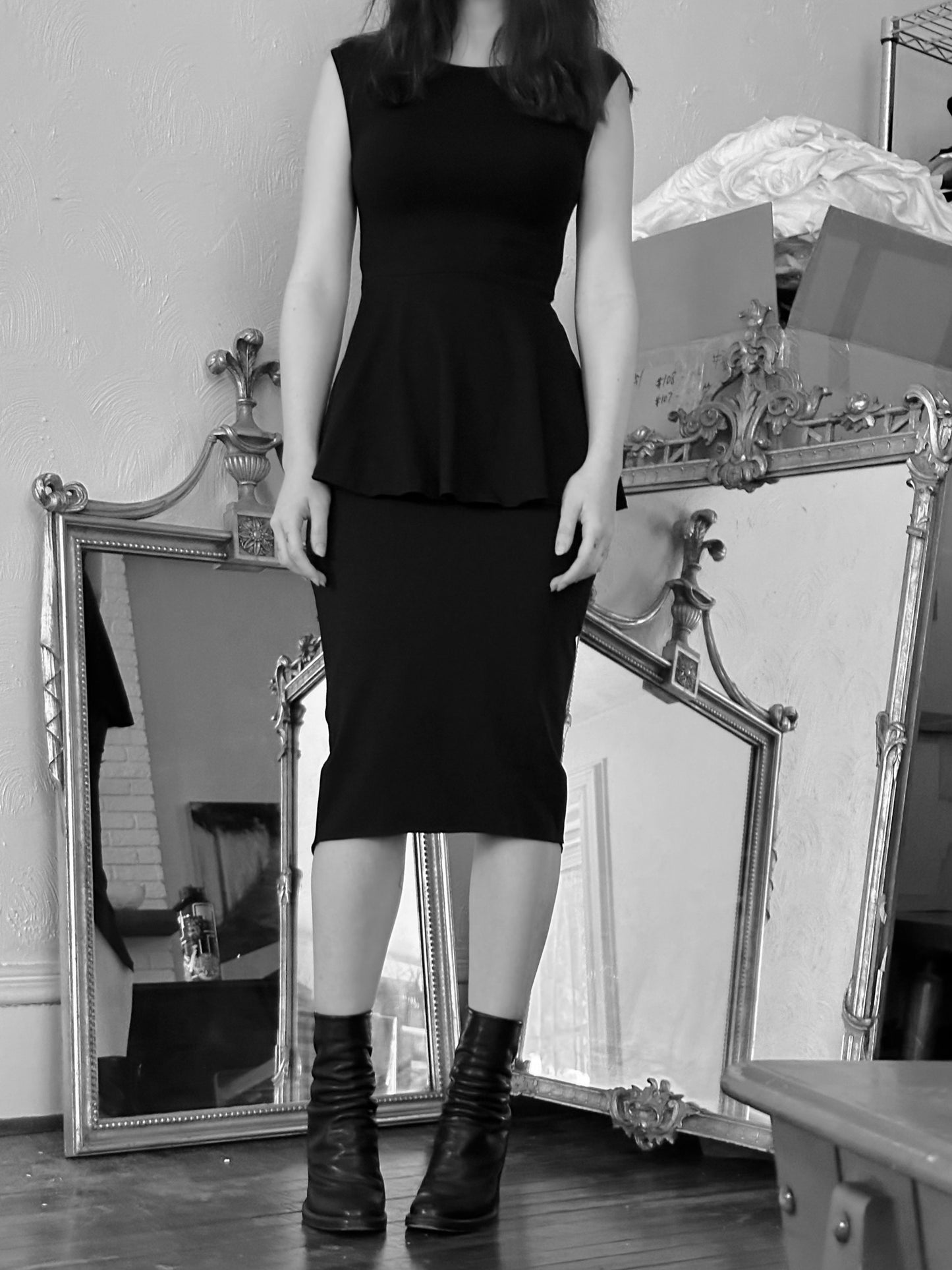 black cotton spandex knee length pencil skirt front on model